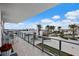 Expansive rooftop terrace with lounge seating, a mini-golf course, and stunning views at 5120 Marina Way # 6603, Tampa, FL 33611