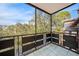 Balcony offering outdoor living space with a view of the surrounding greenery and clear sky at 5980 80Th N St # 410, St Petersburg, FL 33709