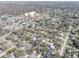 Expansive aerial view of a residential neighborhood with mature trees and winding streets in a quiet community at 6532 30Th N St, St Petersburg, FL 33702