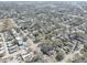 A high aerial shot of a residential neighborhood featuring community landscaping and quiet streets at 6532 30Th N St, St Petersburg, FL 33702