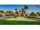 Clubhouse with beautiful landscaping and flag pole at 7882 Sailboat Key S Blvd # 508, South Pasadena, FL 33707