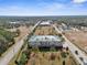 Sprawling community featuring lush landscaping and well-maintained buildings at 8150 Southern Pines Dr, Brooksville, FL 34601