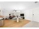 Spacious open living room with dining area featuring hard surface flooring at 8150 Southern Pines Dr, Brooksville, FL 34601