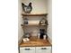 Charming coffee bar area with wooden shelves, butcher block counter, and decorative pieces at 9987 85Th Way, Seminole, FL 33777