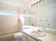 Bathroom with tub/shower combo and single vanity at 1009 Hardwood Dr, Valrico, FL 33596