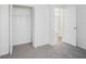 Bedroom featuring an open closet and access to an adjoining room at 1009 Hardwood Dr, Valrico, FL 33596