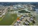 Community aerial view of lakefront properties, highlighting picturesque waterfront living at 1509 Blackstone Cir, Sun City Center, FL 33573