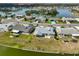 Community aerial view of waterfront properties, highlighting serene lakeside living at 1509 Blackstone Cir, Sun City Center, FL 33573
