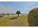 Tranquil backyard with views of the serene lake at 1509 Blackstone Cir, Sun City Center, FL 33573