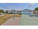 Charming one-story home with a well-manicured lawn, beautiful landscaping, and a spacious two-car garage at 1509 Blackstone Cir, Sun City Center, FL 33573