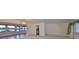 Open concept living room boasts views of the water, creating a tranquil atmosphere at 1509 Blackstone Cir, Sun City Center, FL 33573
