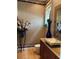 Stylish bathroom with granite countertops, a decorative mirror, and modern fixtures at 1522 Gulf Blvd, Indian Rocks Beach, FL 33785