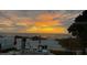 Tranquil beach sunset view from outdoor patio area at 1522 Gulf Blvd, Indian Rocks Beach, FL 33785