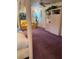 Bright bedroom with a yellow sofa, window and a bed at 1522 Gulf Blvd, Indian Rocks Beach, FL 33785