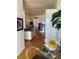 Bright, open kitchen with stainless steel appliances and hardwood floors at 1522 Gulf Blvd, Indian Rocks Beach, FL 33785