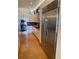 Modern kitchen with stainless steel appliances and white cabinetry at 1522 Gulf Blvd, Indian Rocks Beach, FL 33785
