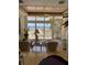 Living room boasting ocean views through large sliding glass doors to the beach at 1522 Gulf Blvd, Indian Rocks Beach, FL 33785