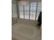 Main bathroom showing jetted tub and privacy shutters with ocean view at 1522 Gulf Blvd, Indian Rocks Beach, FL 33785