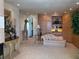 Sitting area in main bedroom features custom built-ins and comfortable seating at 1522 Gulf Blvd, Indian Rocks Beach, FL 33785