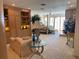 Spacious main bedroom with sitting area, fireplace, and walkout to covered balcony at 1522 Gulf Blvd, Indian Rocks Beach, FL 33785