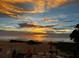 Beautiful sunset view from the patio overlooking the beach and ocean at 1522 Gulf Blvd, Indian Rocks Beach, FL 33785