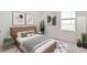 This bedroom has a minimal design style with neutral colors and a window at 17259 Whiskey Creek Trl, Parrish, FL 34219