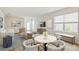 Inviting living room with modern furniture, neutral decor, and ample natural light at 17259 Whiskey Creek Trl, Parrish, FL 34219