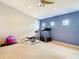 Spacious bonus room with modern interior, neutral tones, and carpet flooring at 1805 Abbey Trace Dr, Dover, FL 33527