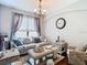 Cozy living room with comfortable seating, natural light, and neutral decor at 1805 Abbey Trace Dr, Dover, FL 33527