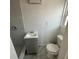 Clean bathroom featuring a new vanity, toilet, and tiled shower, providing a modern look at 1817 Meridel Ave, Tampa, FL 33612