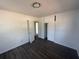 Bedroom with closet and open doorway at 1817 Meridel Ave, Tampa, FL 33612