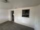 Living room with pass through to kitchen at 1817 Meridel Ave, Tampa, FL 33612