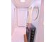 Welcoming entryway featuring a shoe rack, a mirror, and neutral paint at 1900 68Th N St # 104, St Petersburg, FL 33710