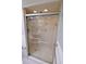Walk-in shower with grab bar and glass door at 1900 68Th N St # 104, St Petersburg, FL 33710