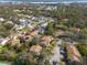 Residential neighborhood with community pools, water views, and mature trees at 2105 Clover Hill Rd, Palm Harbor, FL 34683