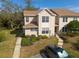 Daytime aerial view of home and its surroundings at 2105 Clover Hill Rd, Palm Harbor, FL 34683