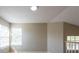 Cozy loft space with lots of natural light and wood-look flooring at 2105 Clover Hill Rd, Palm Harbor, FL 34683