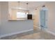 The kitchen has stainless steel appliances, a breakfast bar, and ample cabinet space at 2207 S Carolina Ave # 16, Tampa, FL 33629