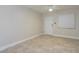 Bright and airy living room featuring tiled floors, a ceiling fan, and a neutral color palette at 2207 S Carolina Ave # 16, Tampa, FL 33629
