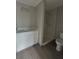 Bathroom featuring a white vanity and white marble tiled shower at 2222 E Emma Street, Tampa, FL 33610