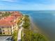 Apartment buildings adjacent to a waterfront walkway and beautiful bay at 2722 Via Tivoli # 430A, Clearwater, FL 33764