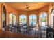 Interior lounge area of the community clubhouse overlooks the pool at 2722 Via Tivoli # 430A, Clearwater, FL 33764
