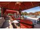 Poolside lounging under shaded cabanas near the community swimming pool at 2722 Via Tivoli # 430A, Clearwater, FL 33764