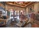 Grand living room with exquisite architectural details, marble floors, and elegant furnishings at 2722 Via Tivoli # 430A, Clearwater, FL 33764