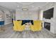 Spacious living room with contemporary design, including a fireplace, hardwood flooring, and stylish furniture at 2722 Via Tivoli # 430A, Clearwater, FL 33764