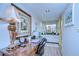 Hallway with a decorative desk area leading to the bathroom at 29230 Bay Hollow Dr # 3274, Wesley Chapel, FL 33543