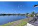 Enjoy a serene view of the tranquil lake and blue skies from your private balcony at 29230 Bay Hollow Dr # 3274, Wesley Chapel, FL 33543