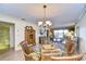 Comfortable open layout of the living room and dining area, offering both style and functionality at 29230 Bay Hollow Dr # 3274, Wesley Chapel, FL 33543