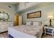 Bedroom featuring a white bed and bedside tables and stylish decor at 3089 Enisglen Dr, Palm Harbor, FL 34683