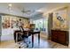 This office is illuminated with natural light, a ceiling fan, and track lighting at 3089 Enisglen Dr, Palm Harbor, FL 34683